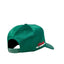 Green cap with red and white text on a light gray background