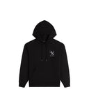 Black hoodie with a small logo on the chest against a light gray background