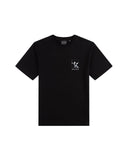 Black t-shirt with a small logo on a light gray background